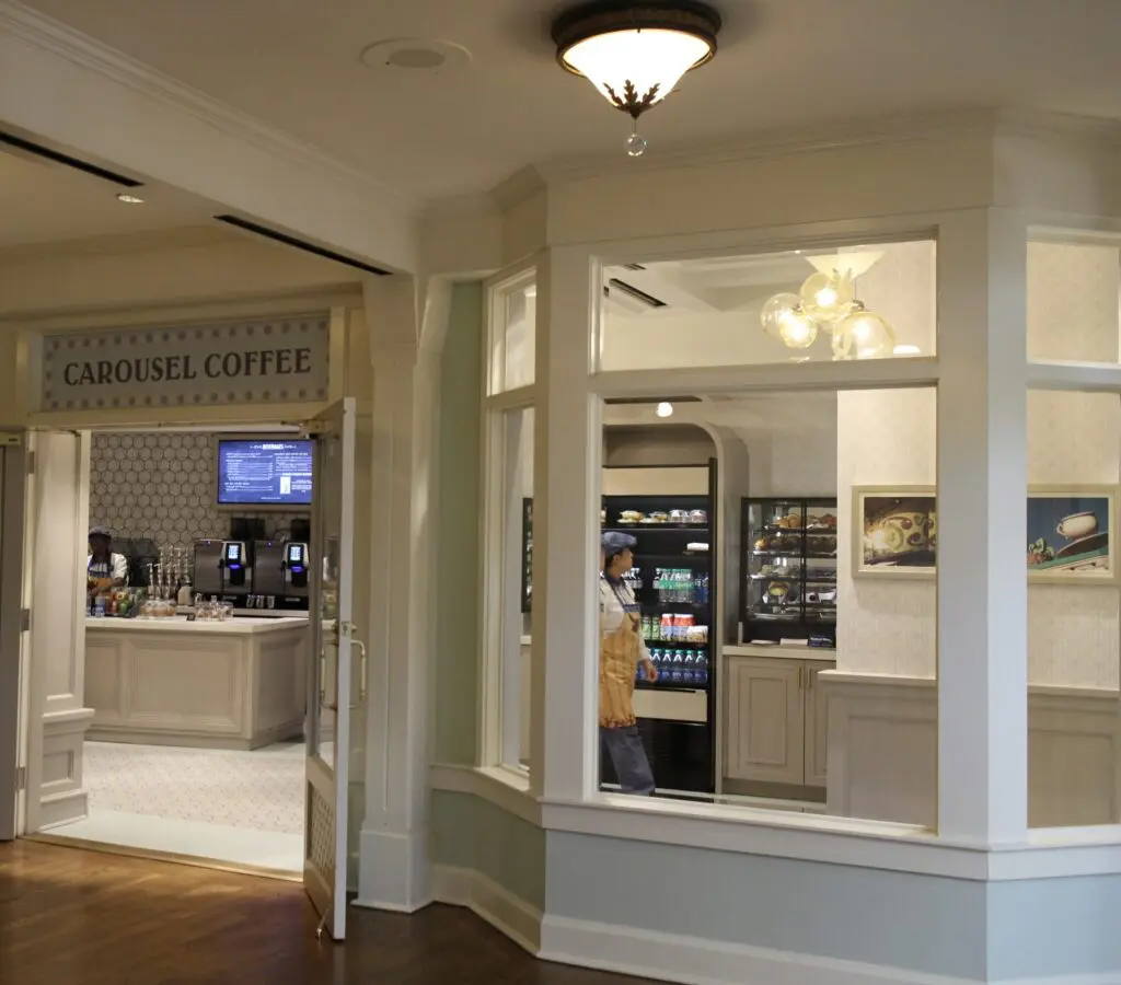 A white, modern coffee shop in the BoardWalk lobby.