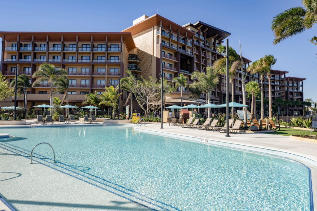 Polynesian Island Tower building with a pool in front of it