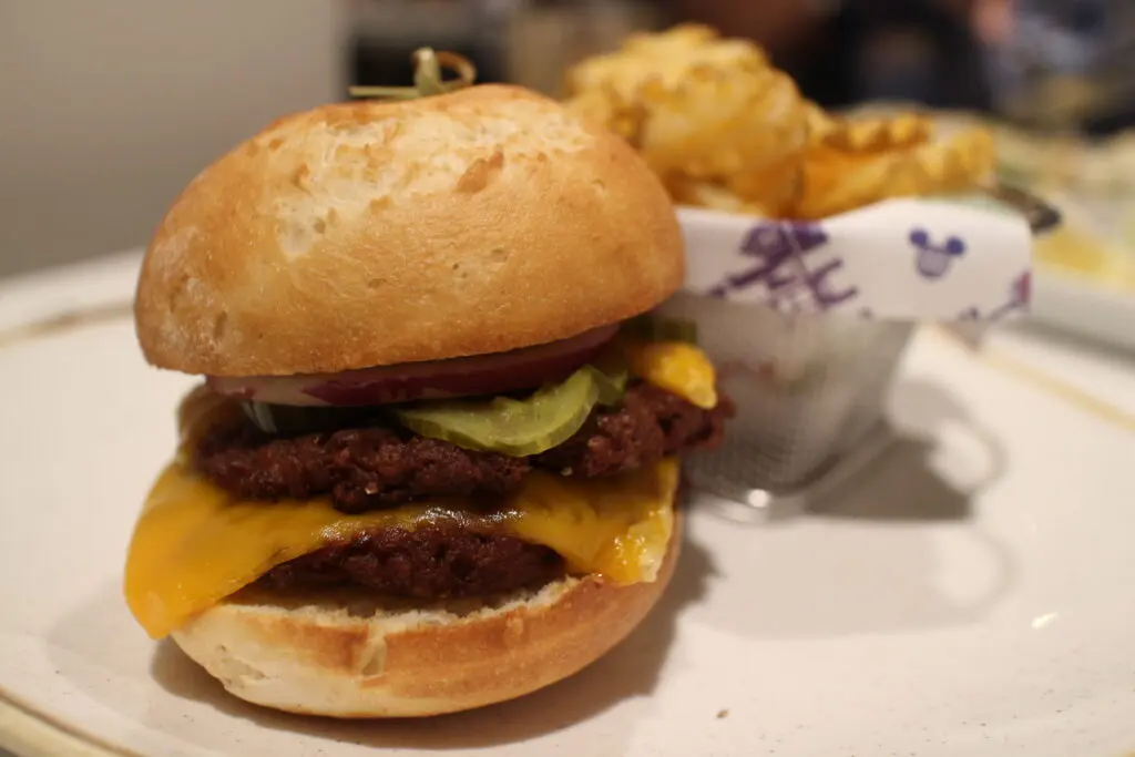 Burger on a white plate at Steakhouse 71.