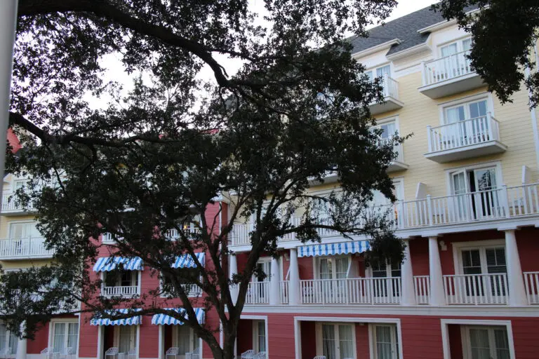 The Disney BoardWalk Resort exterior with trees in front of it.