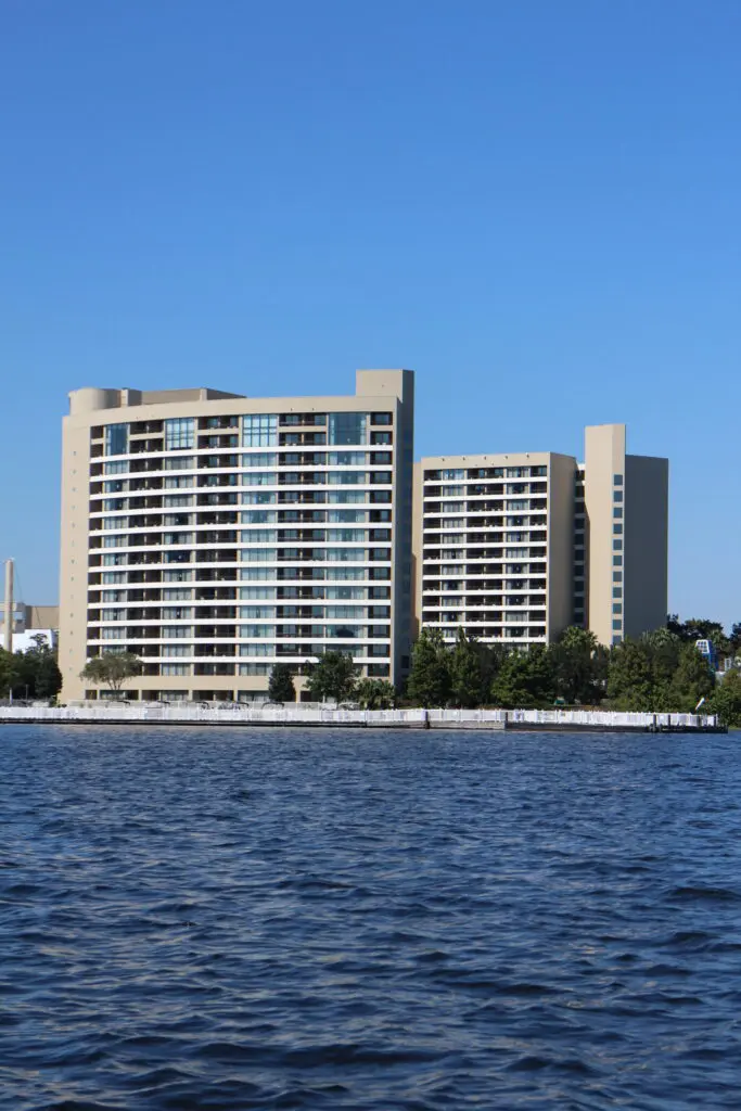 The tall Bay Lake Tower building overlooks the marina and lake.