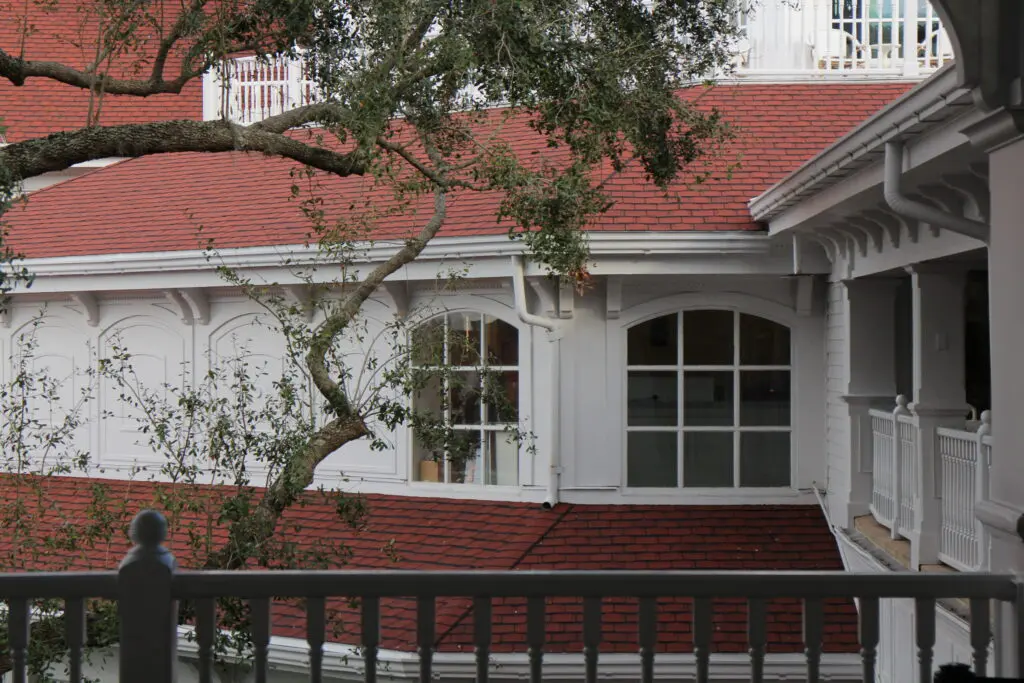 White Grand Floridian hotel building with red roof.