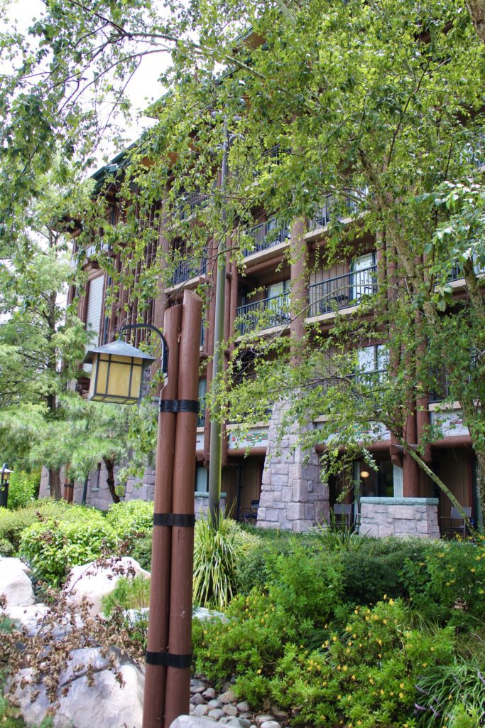 The wooded and stone Copper Creek Villas building at Wilderness Lodge.