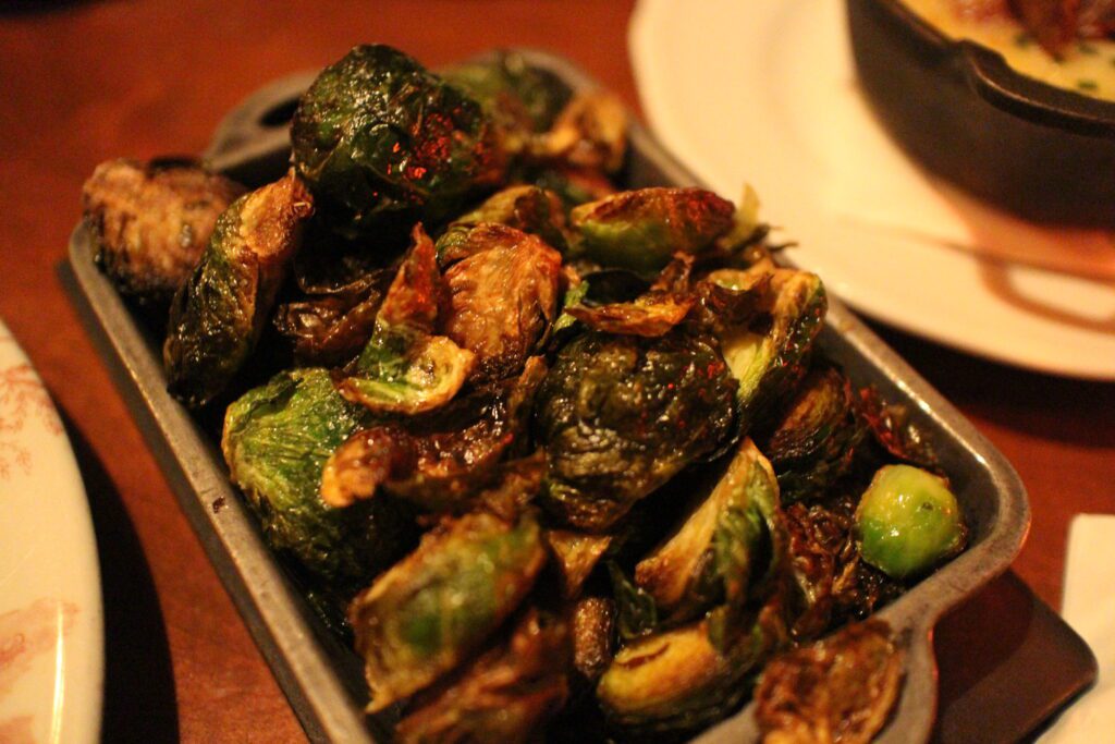 crispy brussel sprouts in a dish at Le Cellier