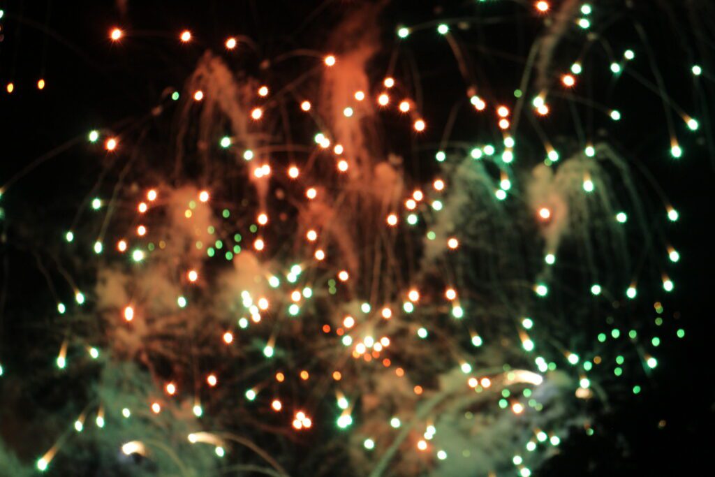 Epcot fireworks colorful, out of focus and abstract in a dark sky