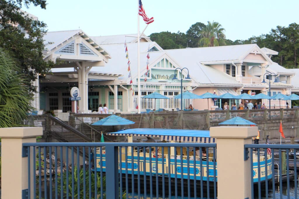 The main area of Disney's Old Key West Resort with a dock and shops in a Disney World news May 2024