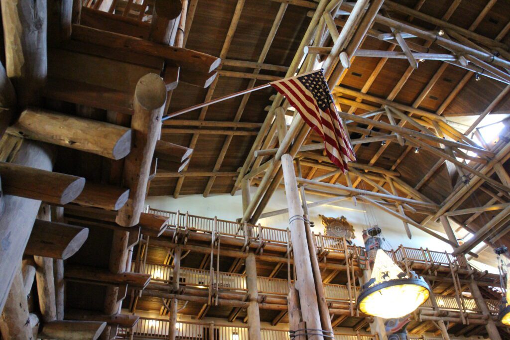 An American flag from another time period hangs in the rustic lobby ceiling of Disney's Wilderness Lodge.