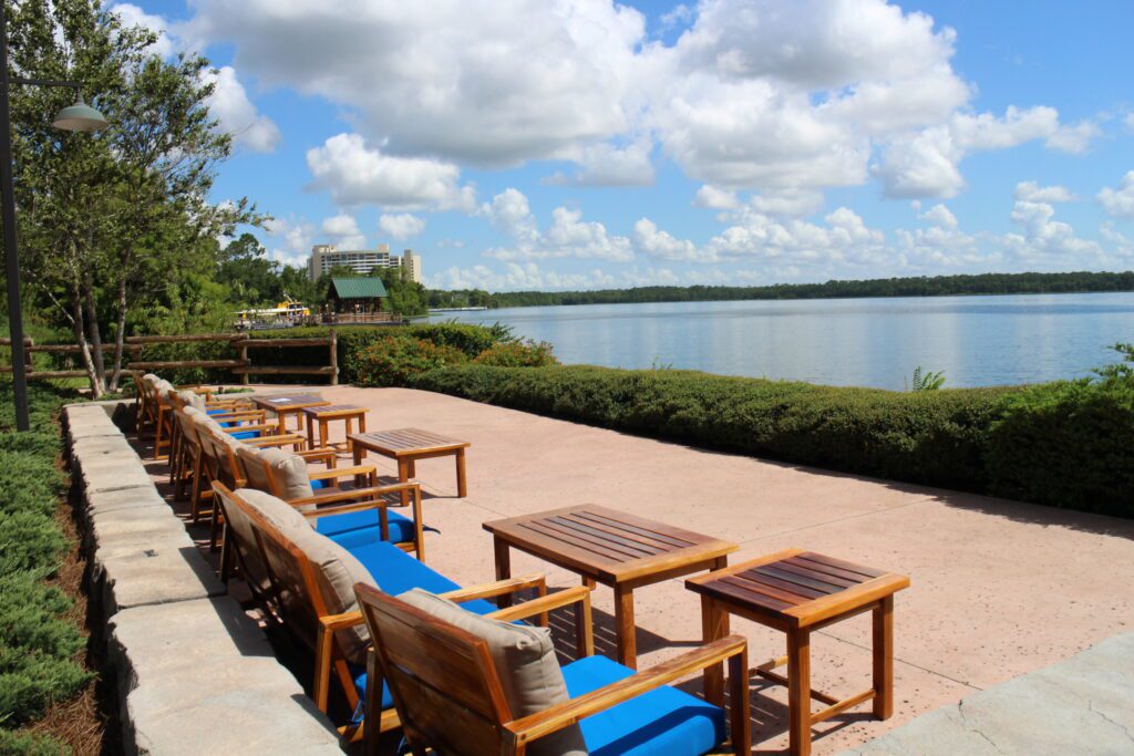 Geyser Point lakeside seating, surrounded by nature where you can get drinks on the water at Disney World.