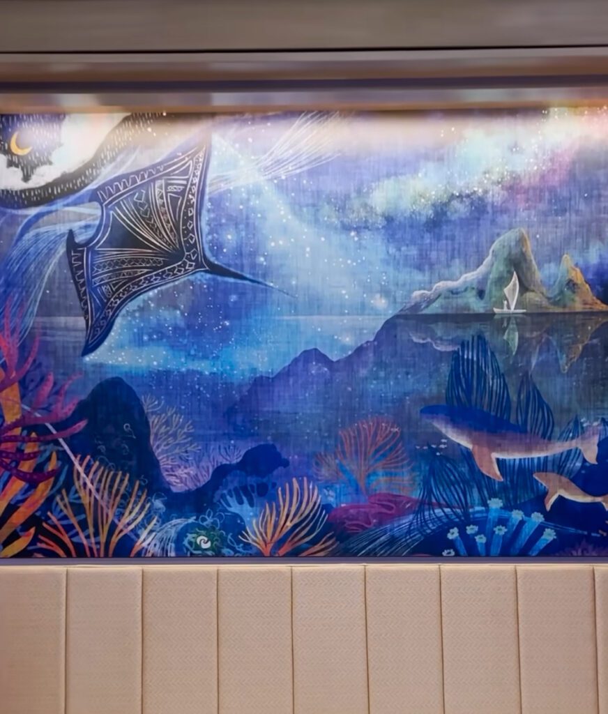 Colorful blue art featuring a manta ray in a Moana Polynesian DVC room.