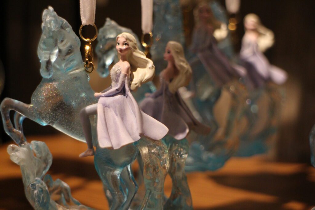 An Elsa ornament inspired by the Frozen 2 scene where she rides an icy horse.