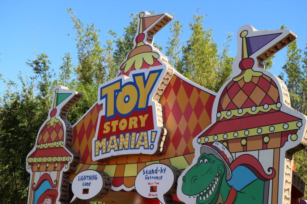 Toy Story Mania at Disney World's colorful entrance that's flat but made to look like a carnival tent.