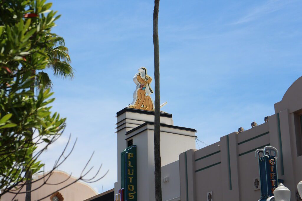 Pluto neon sign on a rooftop building in Hollywood Studios. Disney ROFR DVC July 2024