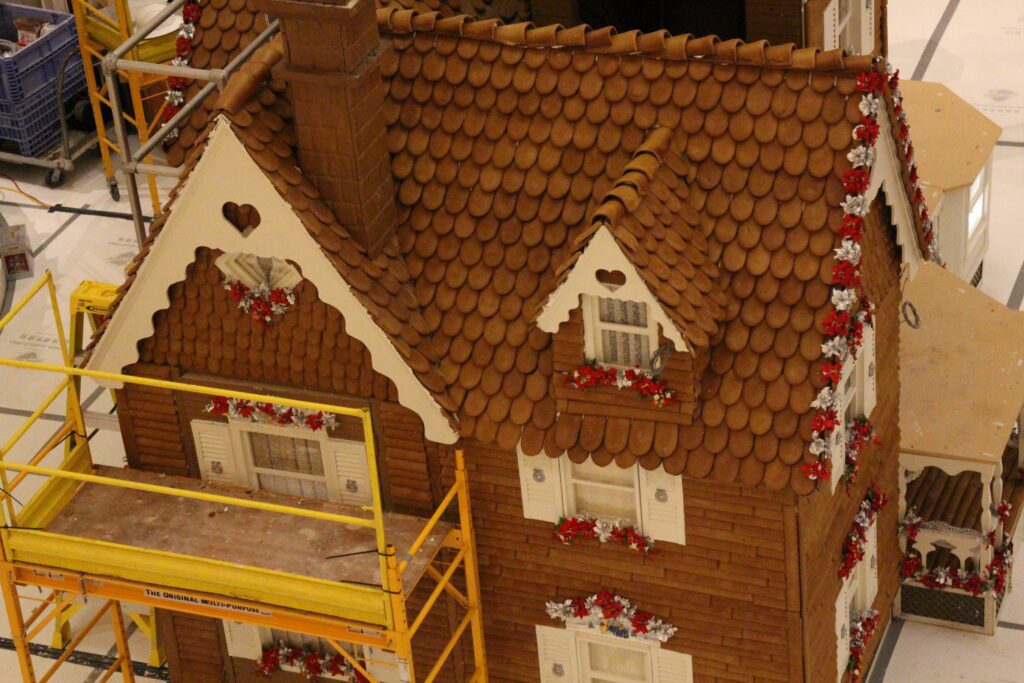 The Grand Floridian gingerbread house under construction.