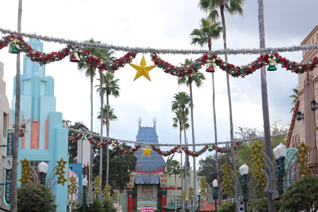 Hollywood Studios Christmas decorations with garlands and stars.