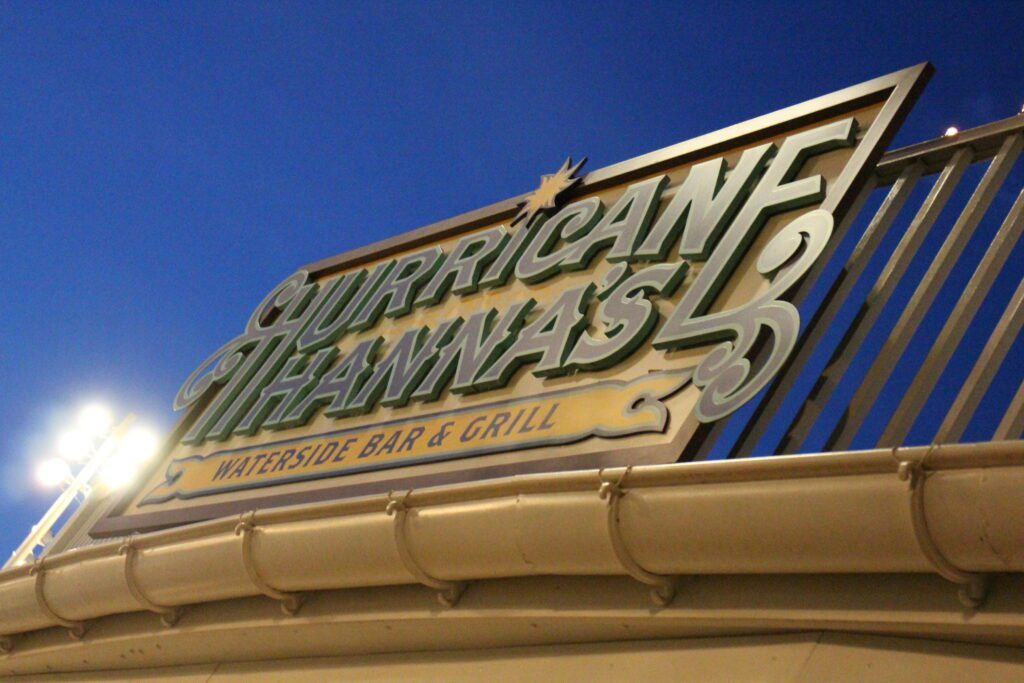 Hurricane Hanna's pool bar sign in the evening.