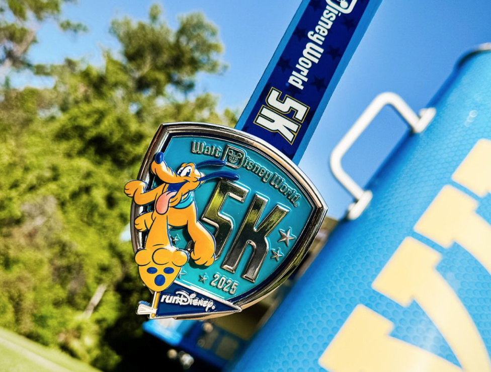 The Disney World 5K medal with Pluto on it.