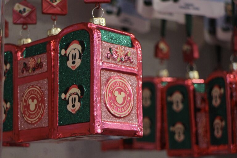 Disney mail box ornament, pink with glitter and Mickey and Minnie on the side.