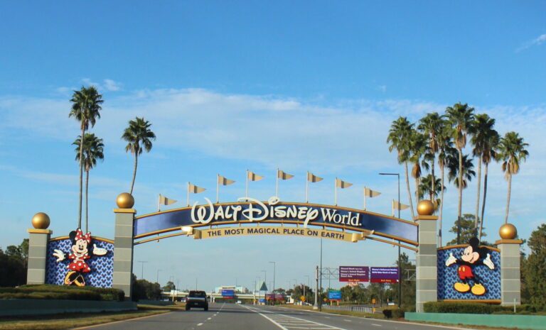 Disney World entrance gate with Mickey and Minnie on it 2024 Disney news